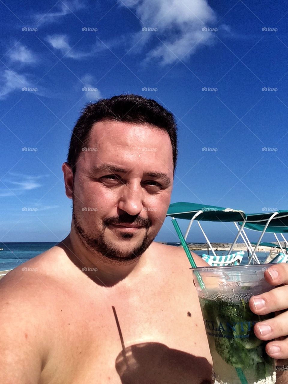"Cheers from Atlantis"
A fruity beverage 

Me on vacation