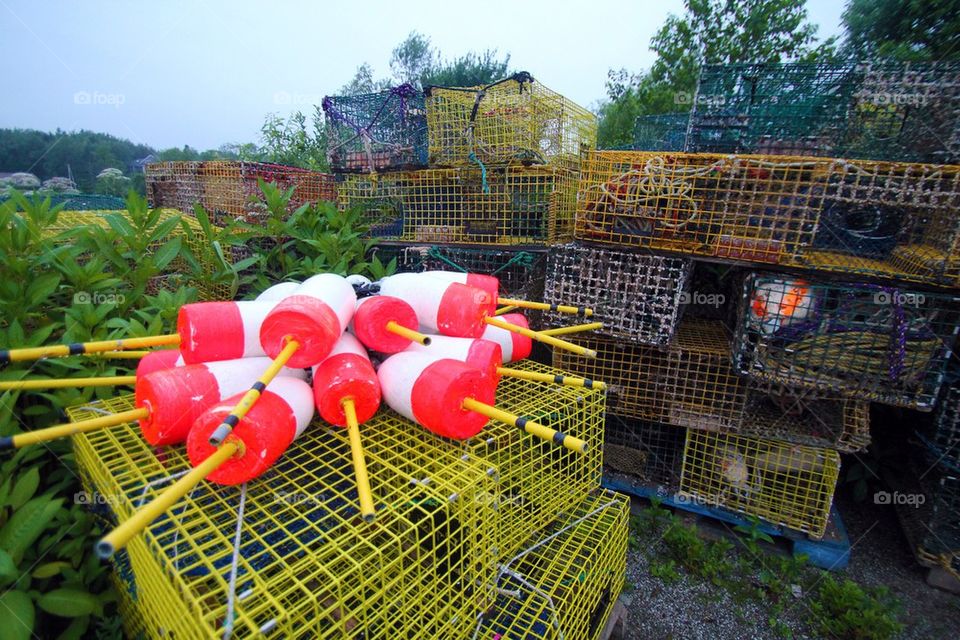 Lobster traps and buoys in Maine