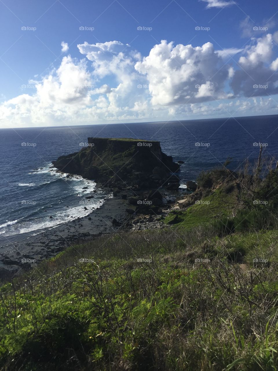 View of the cliffs below the Forbidden Island outlook, including Forbidden Island - located on Saipan. 
