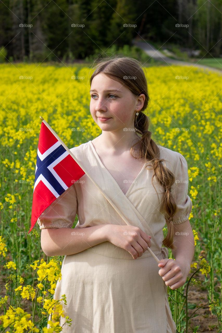Young teen girl into the raps field a may  day . She celebrait norway National day