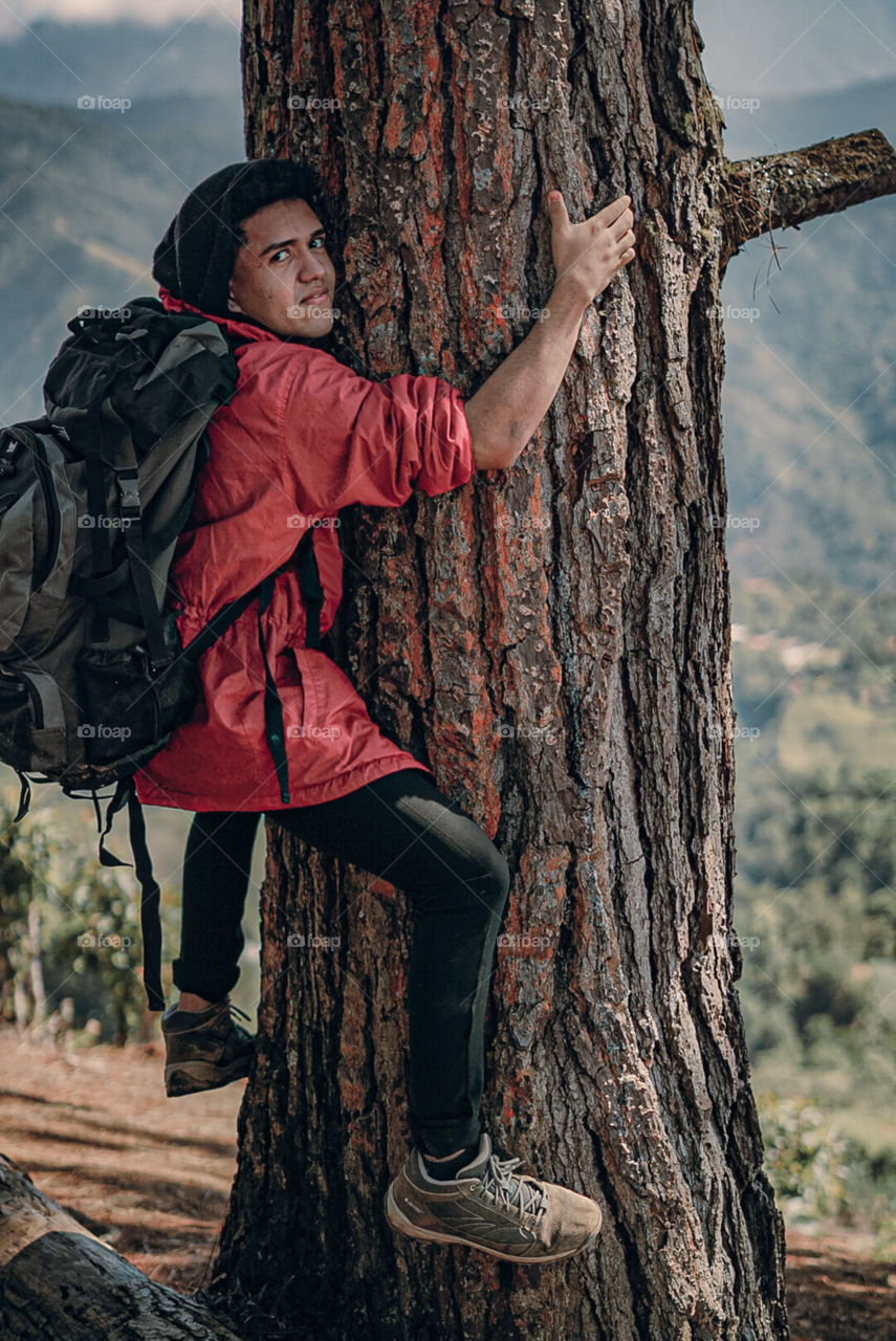 Boy enjoying nature on the mountain