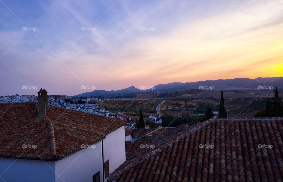 Sunset from the top of a picturesque white village in Spain