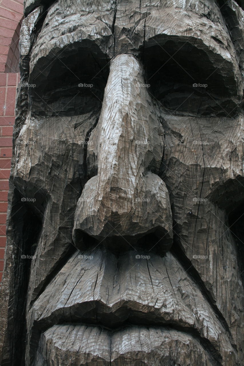 old wood face. visit ing family in Ark