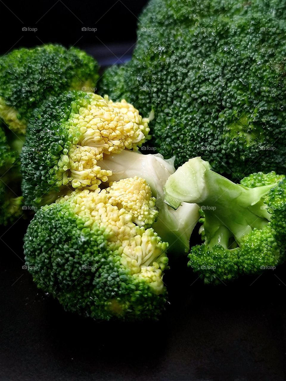 Food. Vegetables. Broccoli cabbage broken pieces. Juicy shades of green