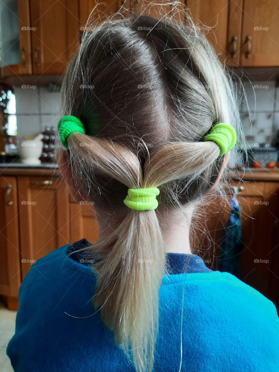 power of three - three ponytails in a little girl