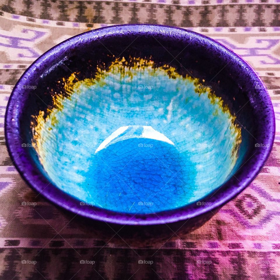 A small cup with so much detail and color, for only 99¢ at a thrift store.