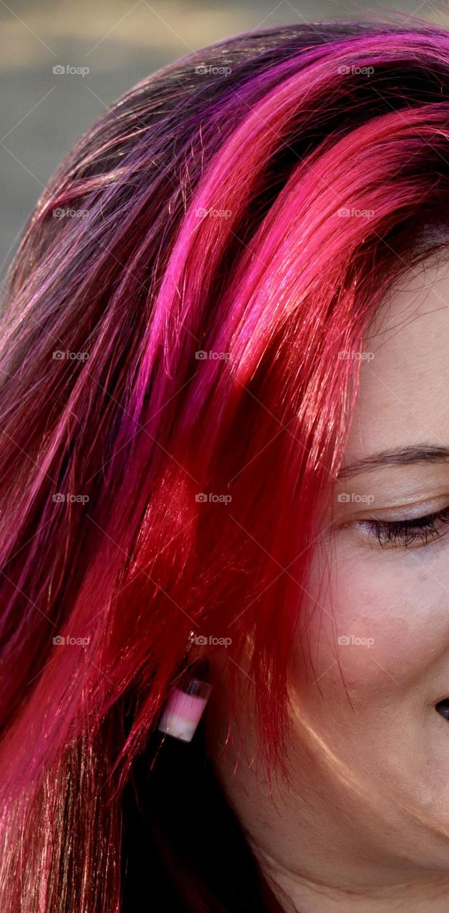 Pink hair girl with pink earring 