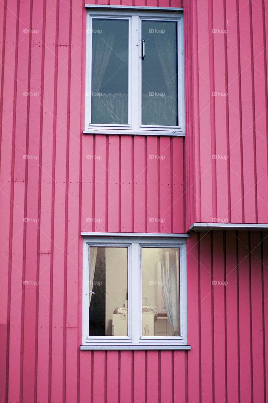pink background wooden wall windows