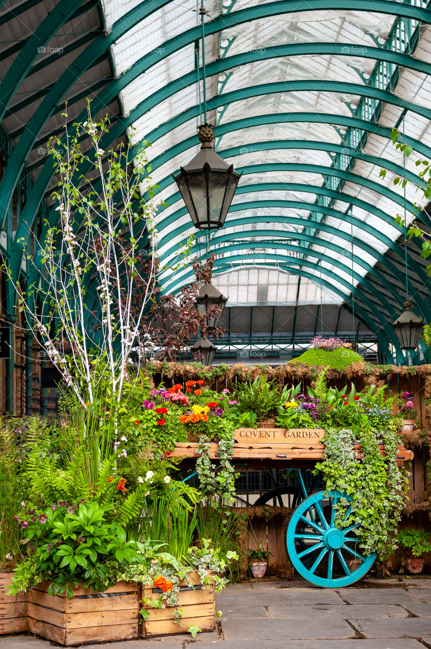 Flowers and plants in famous landmark Covent Garden Market. London. UK.