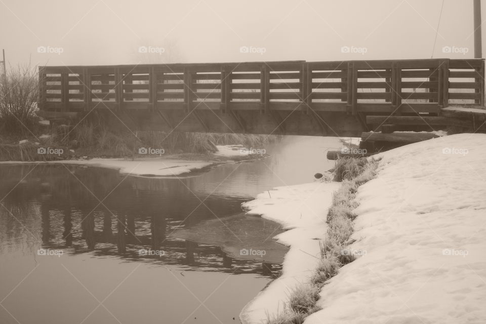 Early morning foggy bridge