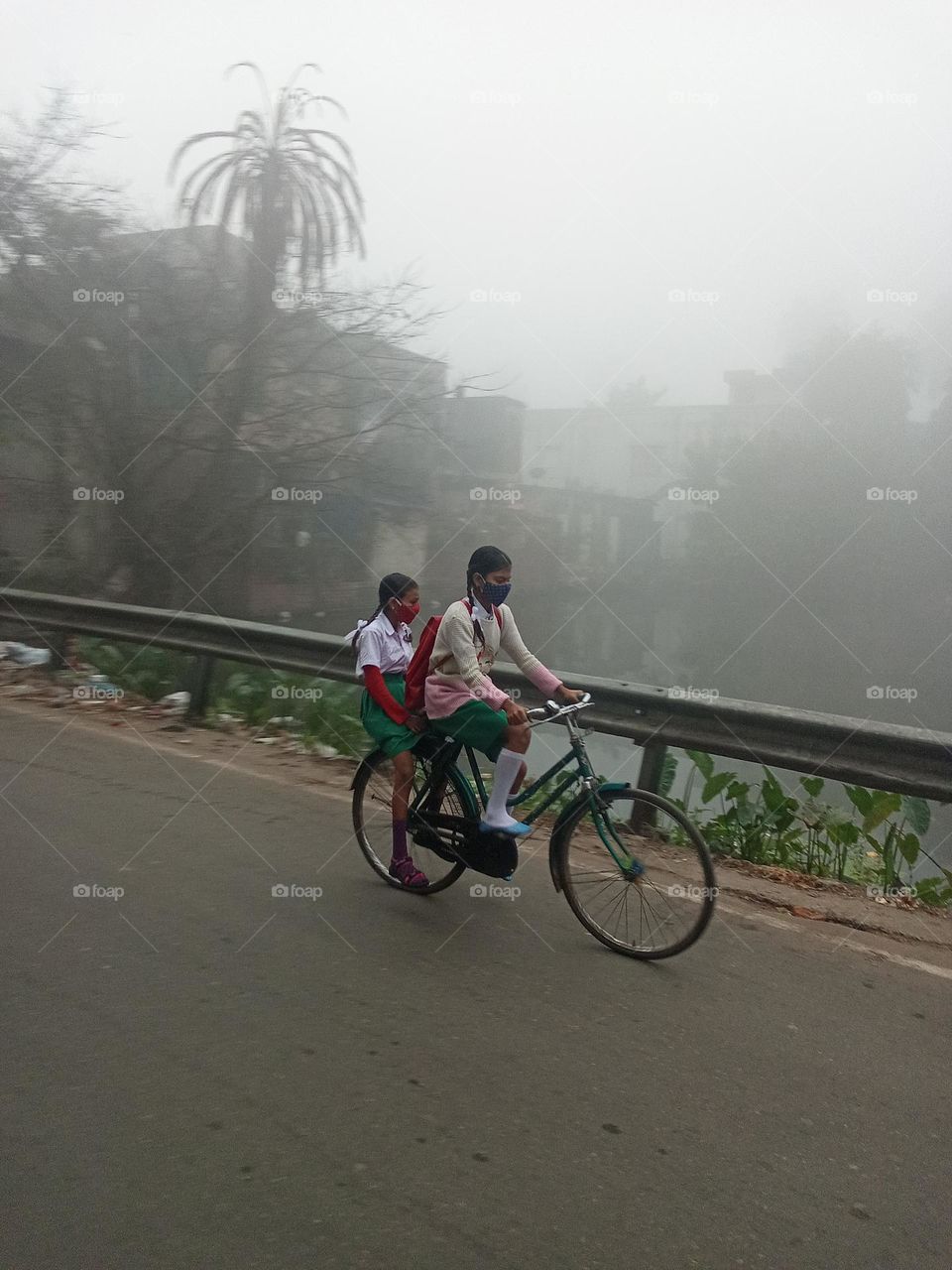 Bicyle ride towards school.