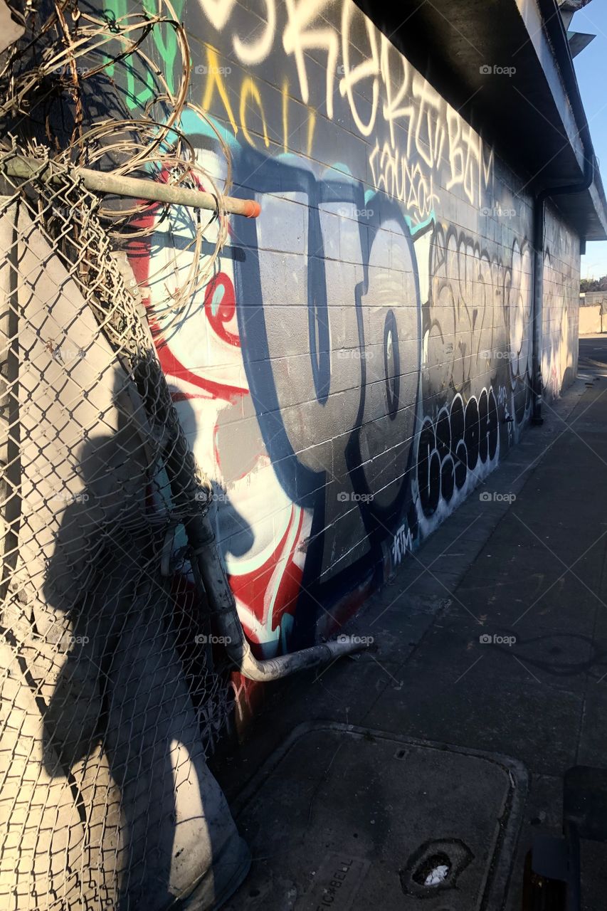 My shadow and graffiti art on 27th st in Oakland California 
