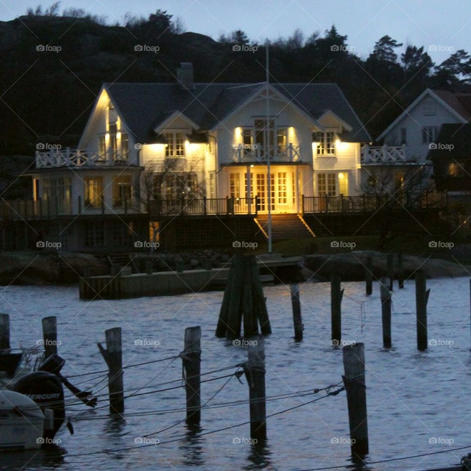 water lights coast house by leta