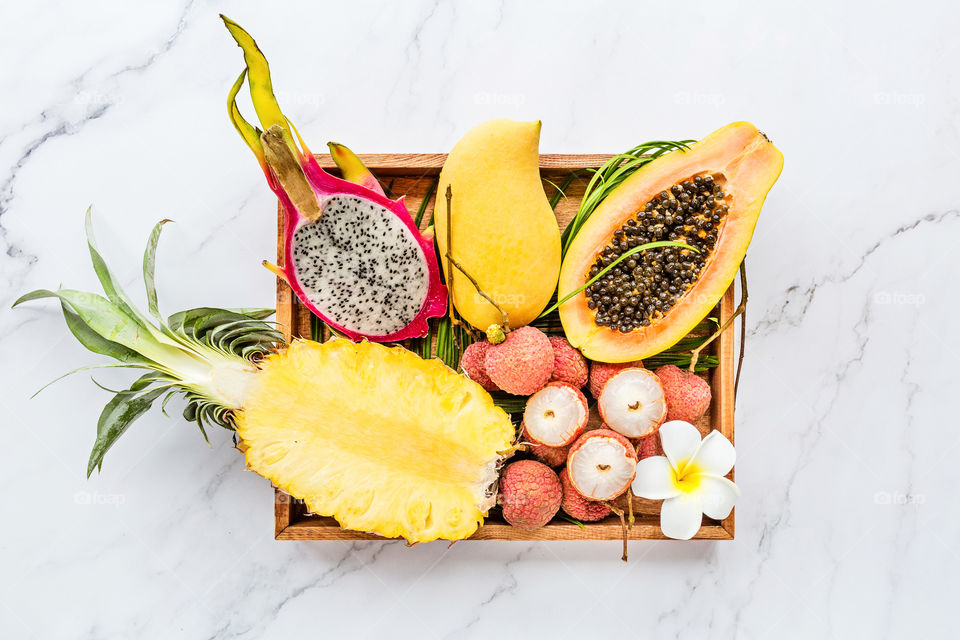 Flat lay of fresh exotic fruits 