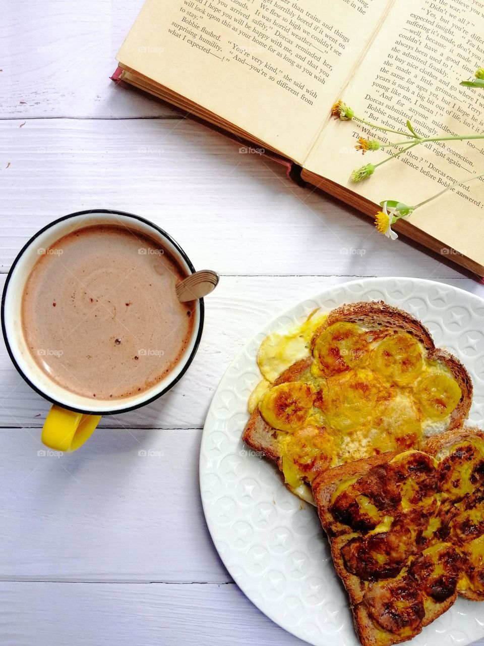 Toast bread with banana for breakfast.