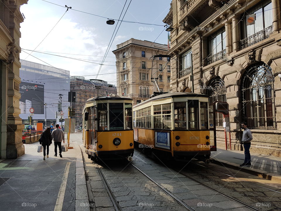 Tram on street in city