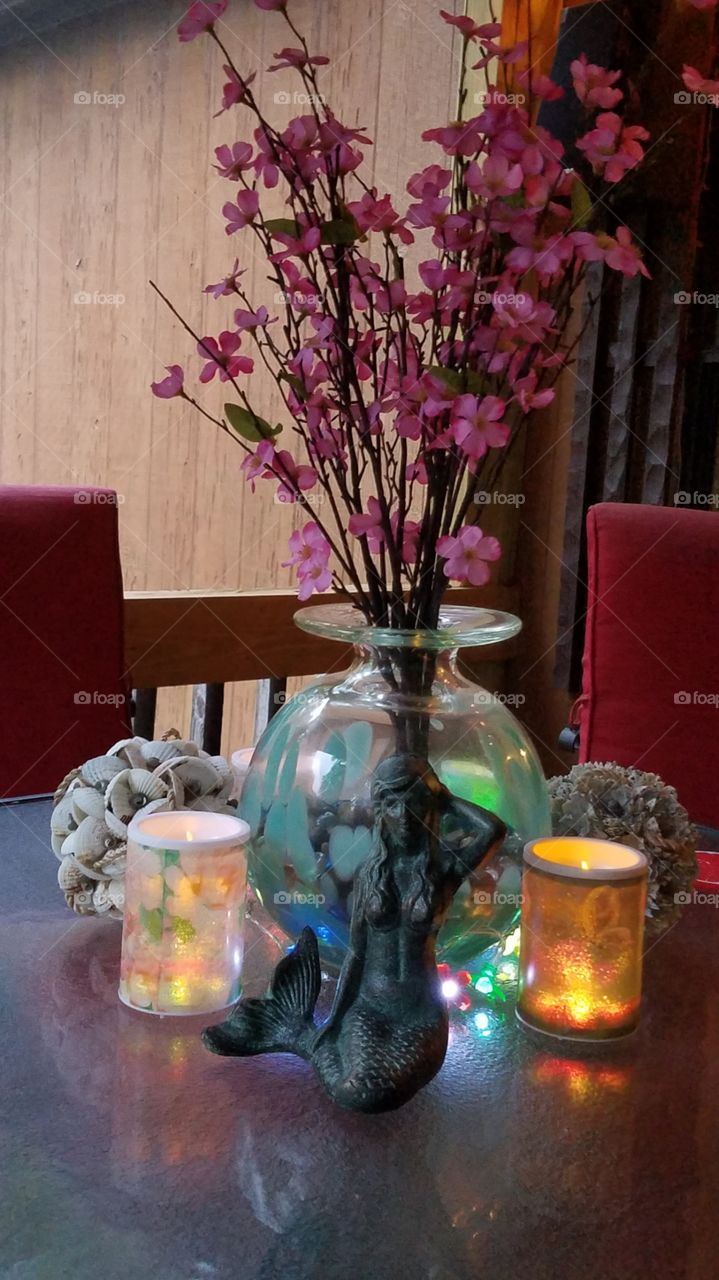 new home for mermaid & seashell balls. front porch table.