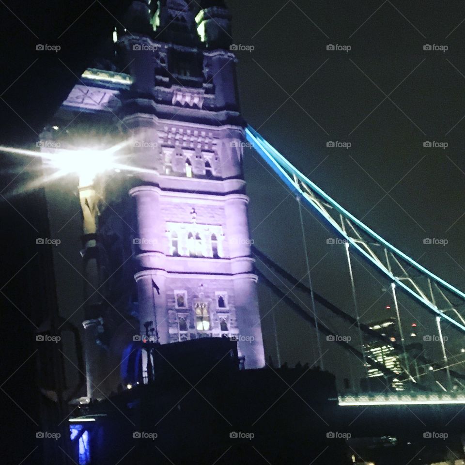 Passing under the London bridge at night 