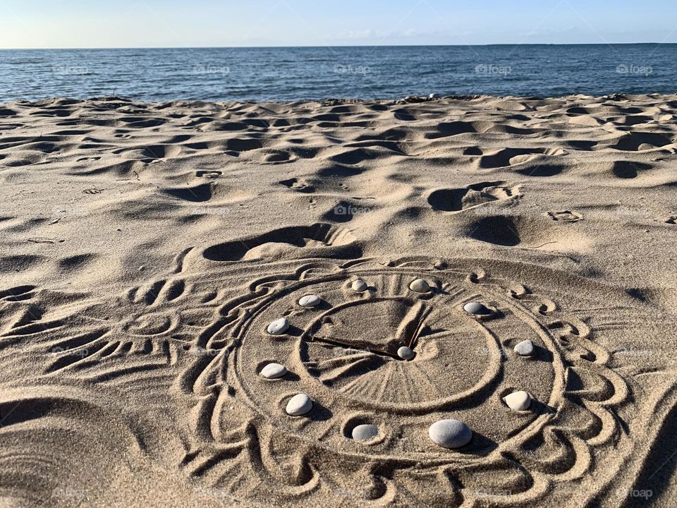 Clock on the Sand