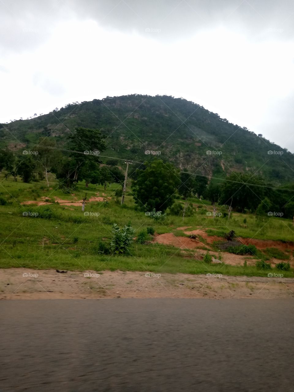 a mountain snapped around military check point at farewell tollgate of Jalingo local government of Taraba state. it's a mountain not too high and some farmers even farm on it.