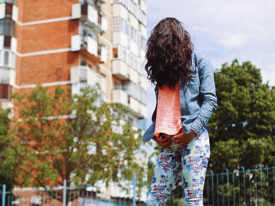 Close-up of girl standing on street