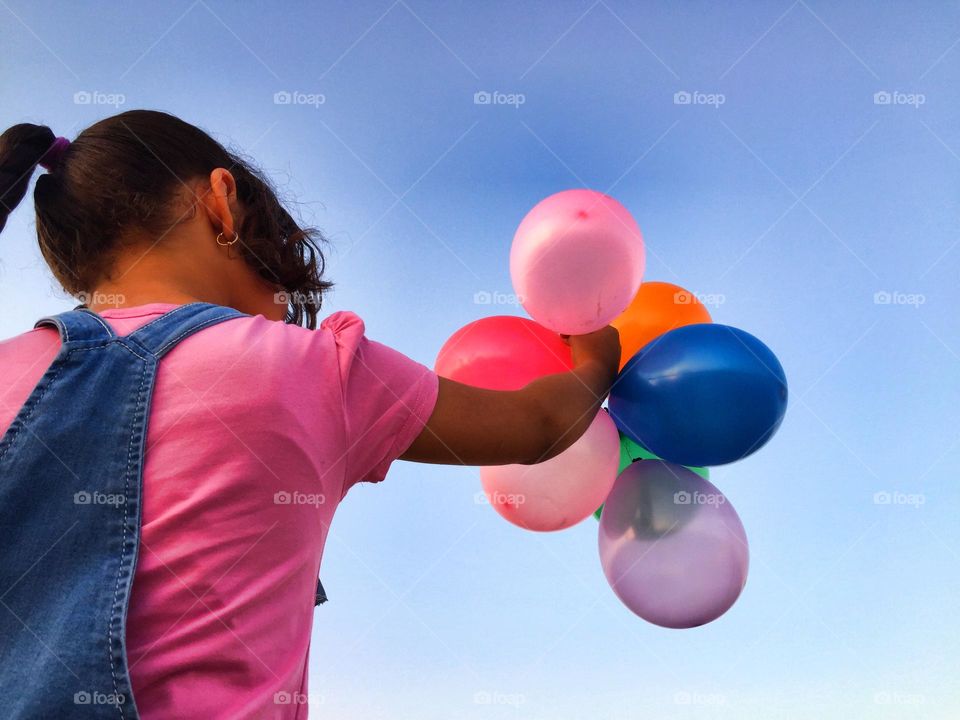 Playing happily with balloons