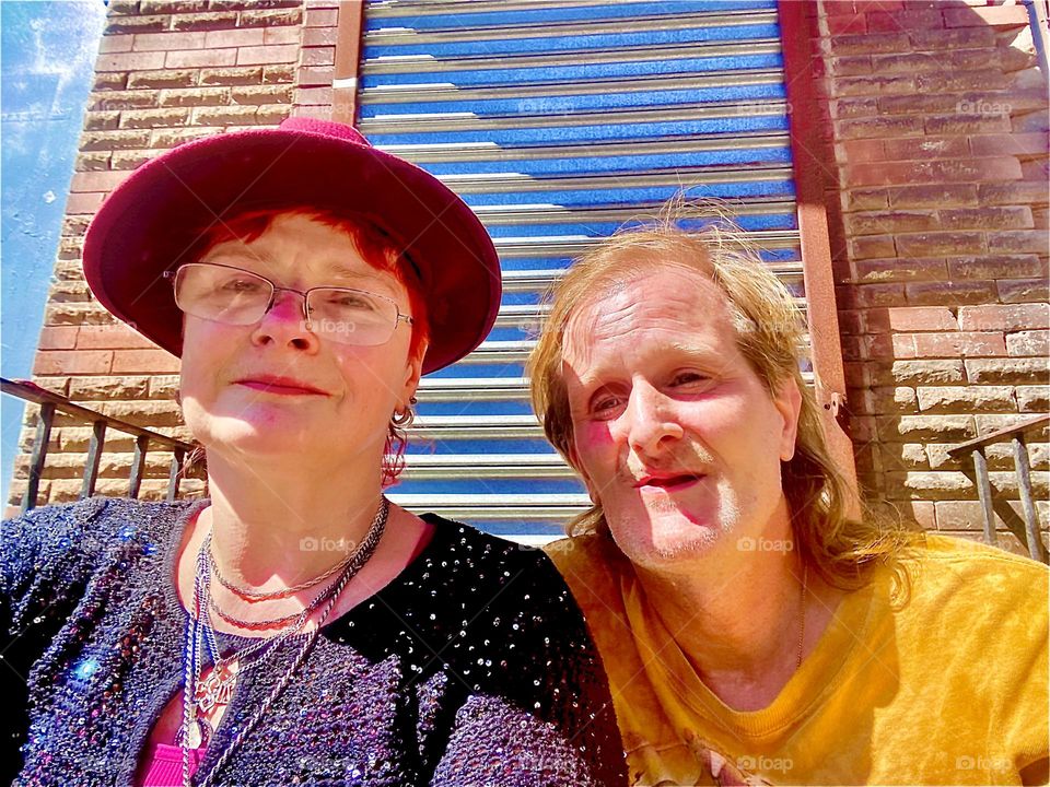 A lovely portrait photograph of Timothy and I sitting on the stoop on „Waverly St“ near „Fulton St“ in picturesque „Clinton Hills“ also known as „Ft Greene“ in „Brooklyn“, NY on a beautiful sunshiny day in 2022. Hypnotic Productions