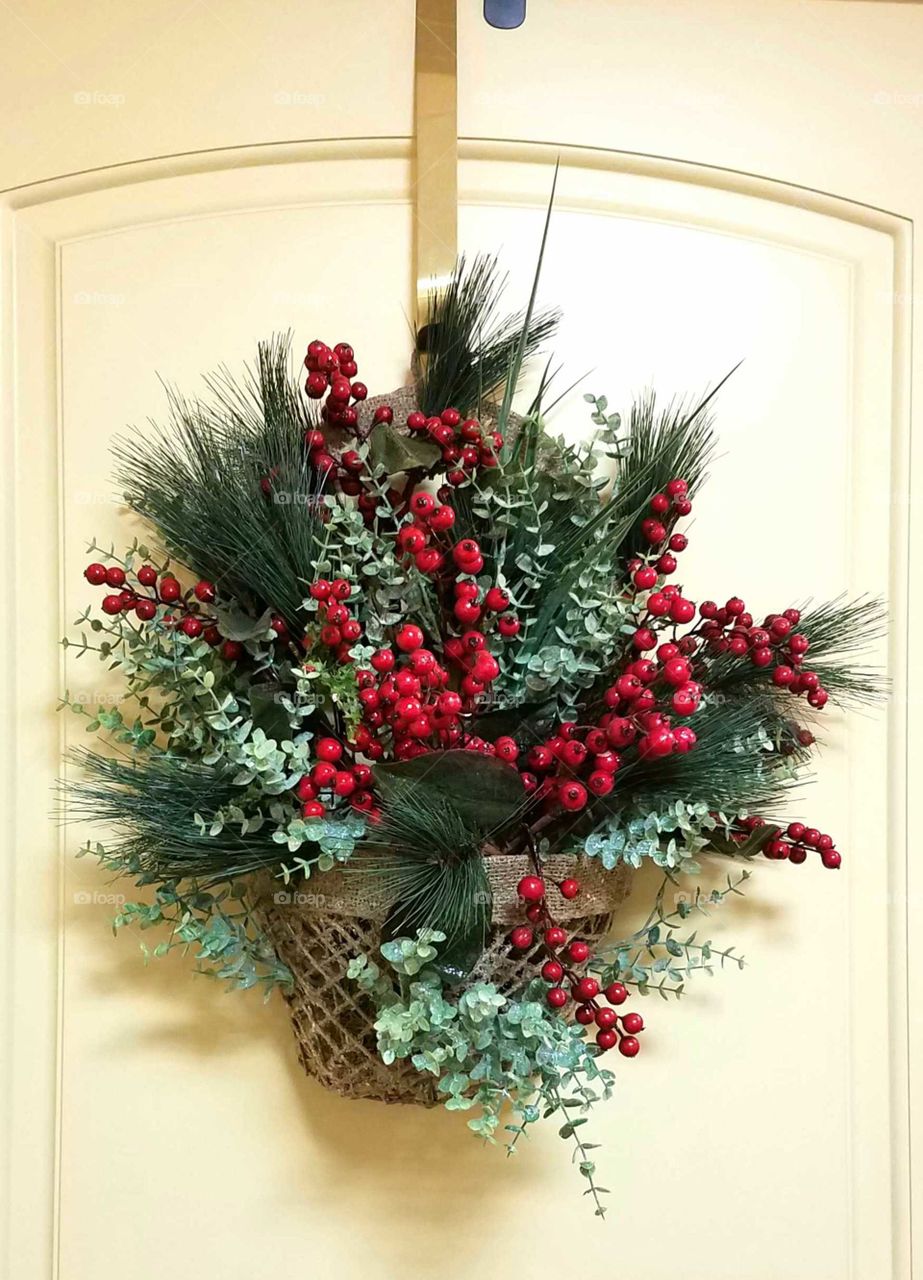 Holly and pine door wreath