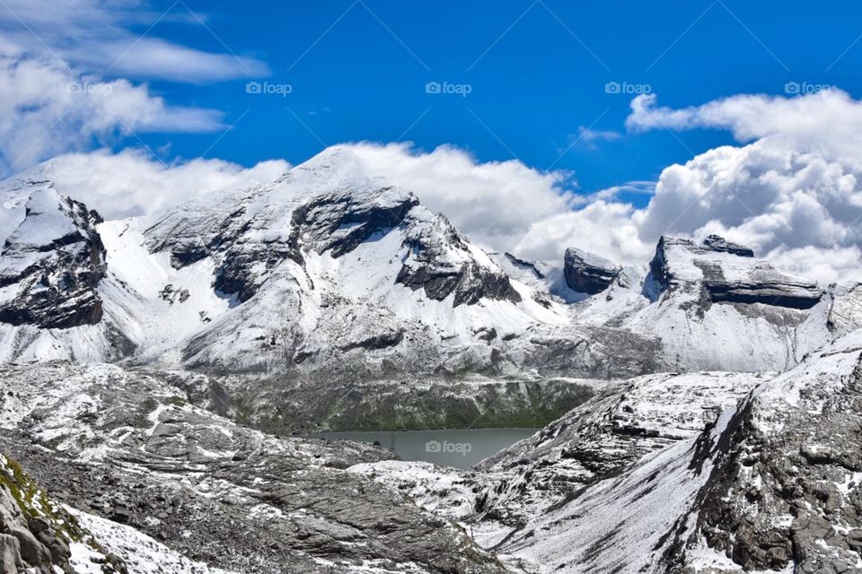 mountain lake in the swiss alps in summer.