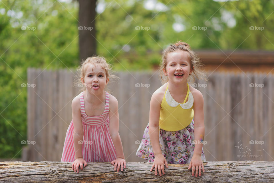 Girls on fence 