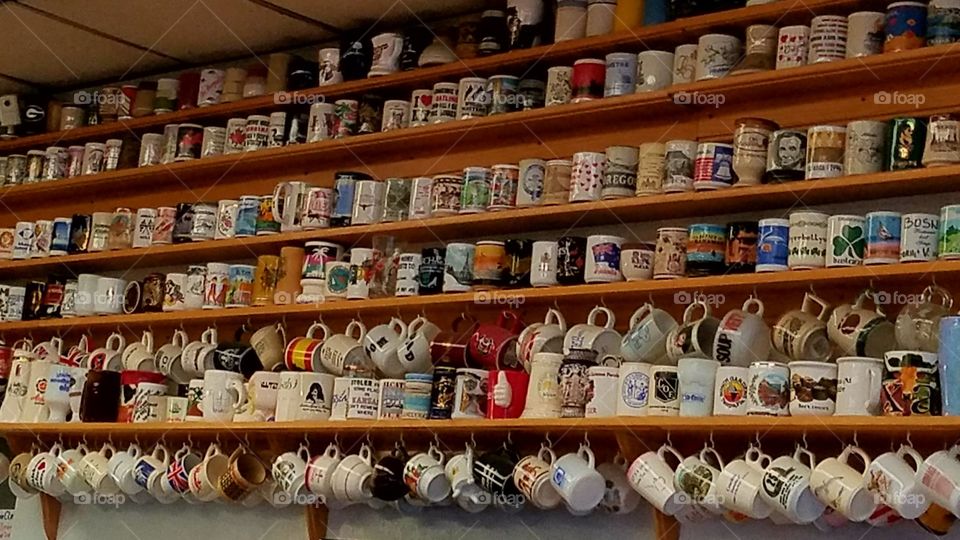 wall of coffee mugs
