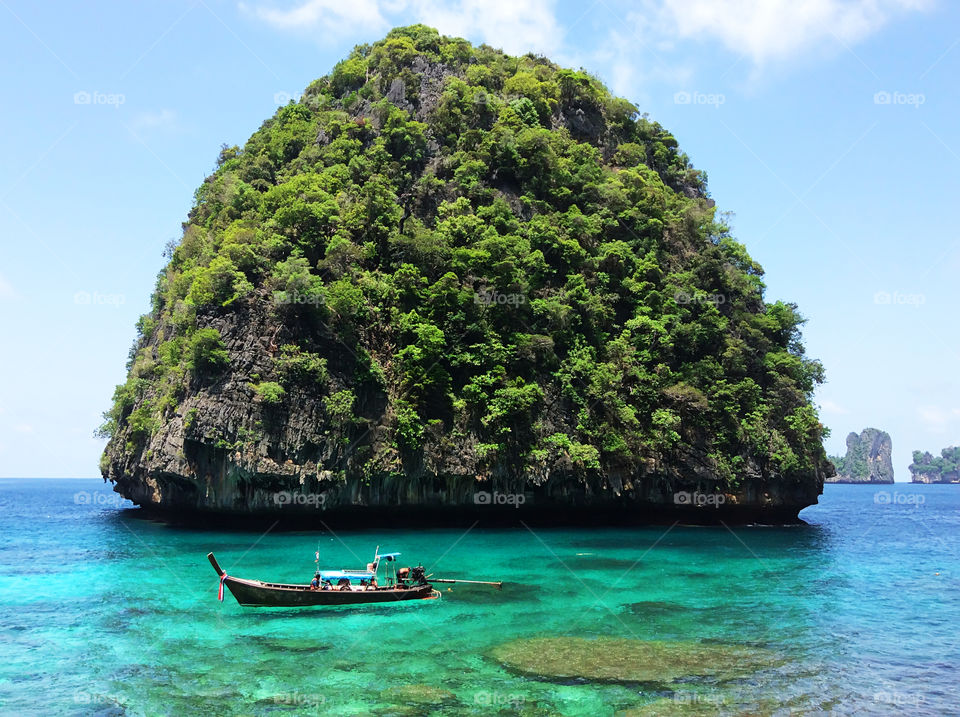 Summer travel to tropical thai islands by boat 