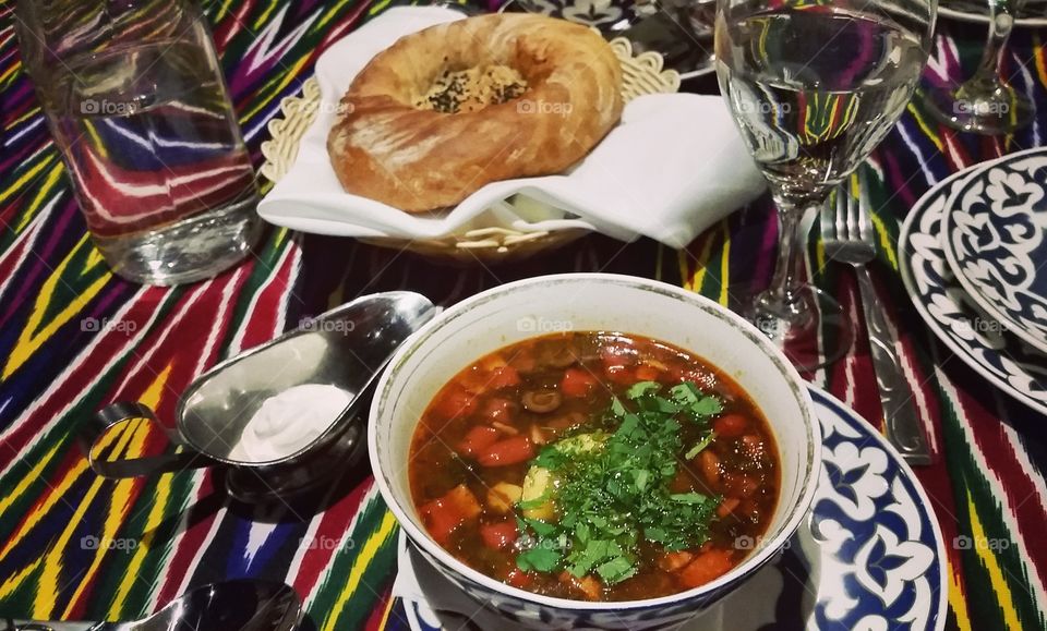 Delicious soup and bread in restaurant in a nice setting