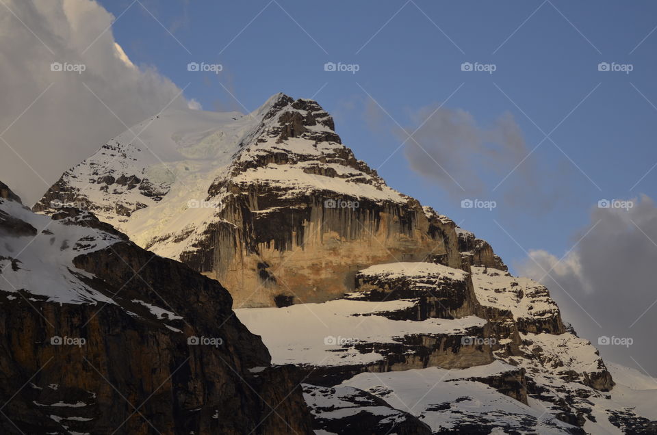 Low angle view of snowcapped mountain