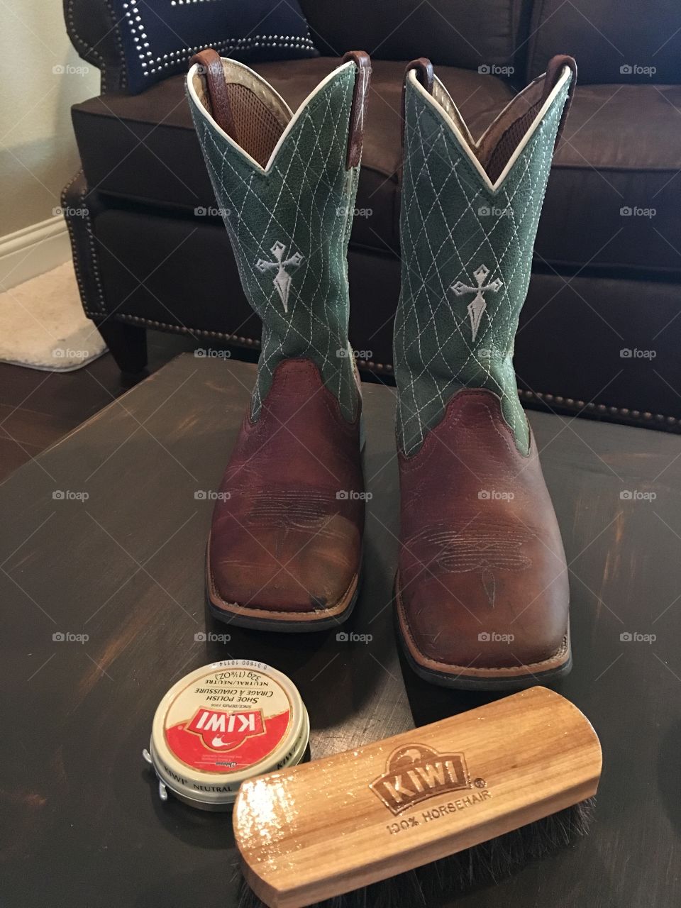 Polishing a pair of worn Twisted X boots.