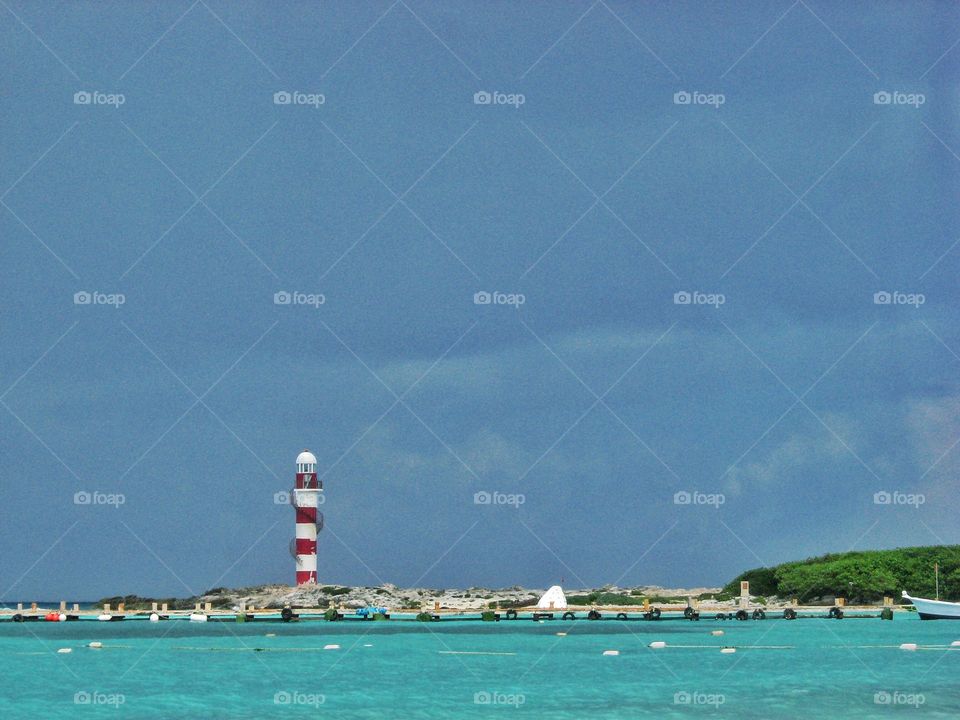 Cancun beach and light house