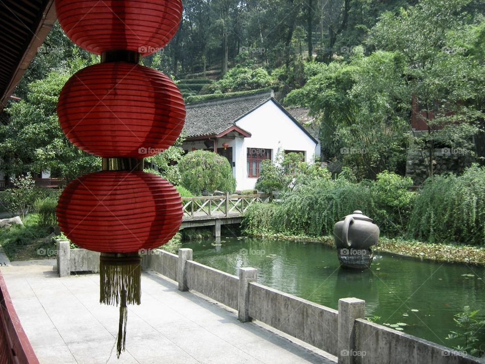 Beautiful Chinese Red Lantern in water garden 