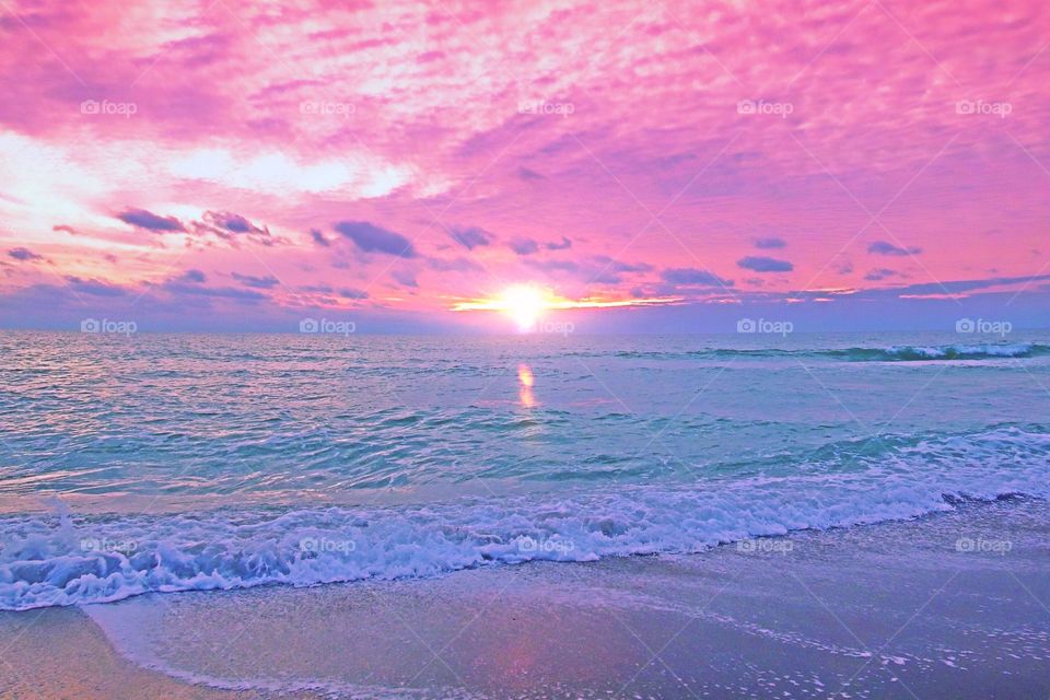 Scenic view of beach at dusk