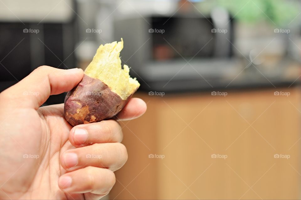 Hand holding a food