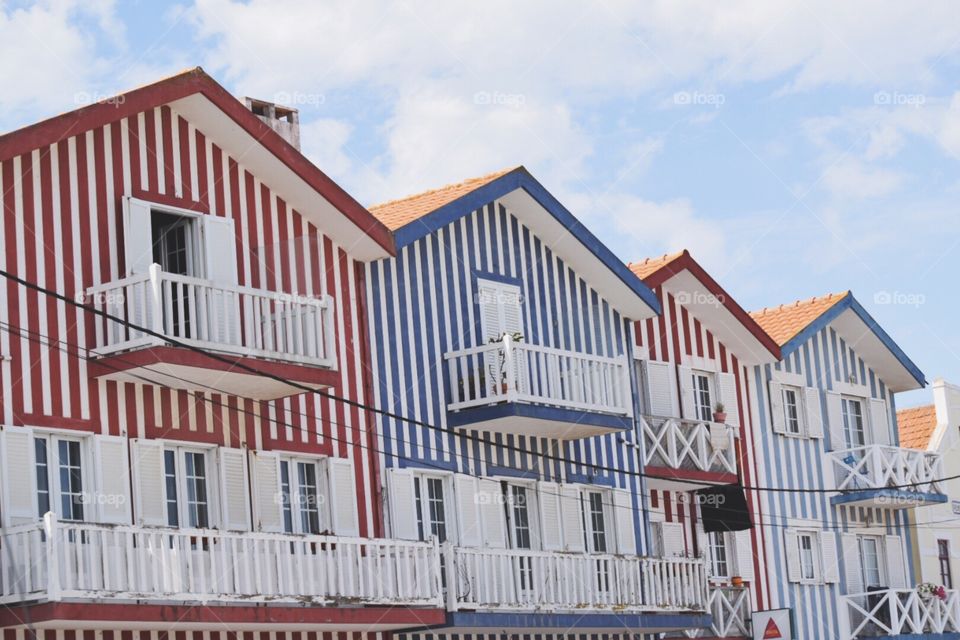 Bright coloured houses in aveiro Portugal 
