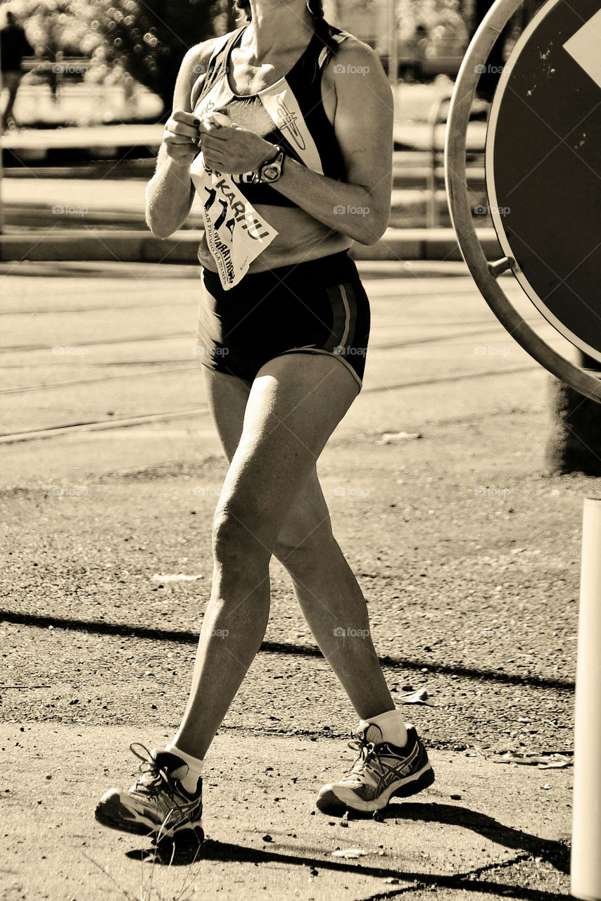 an athlete prepares for the running race