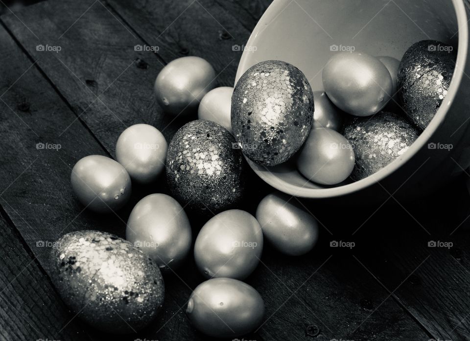 Glitter and shiny eggs in a bowl in Black and white 