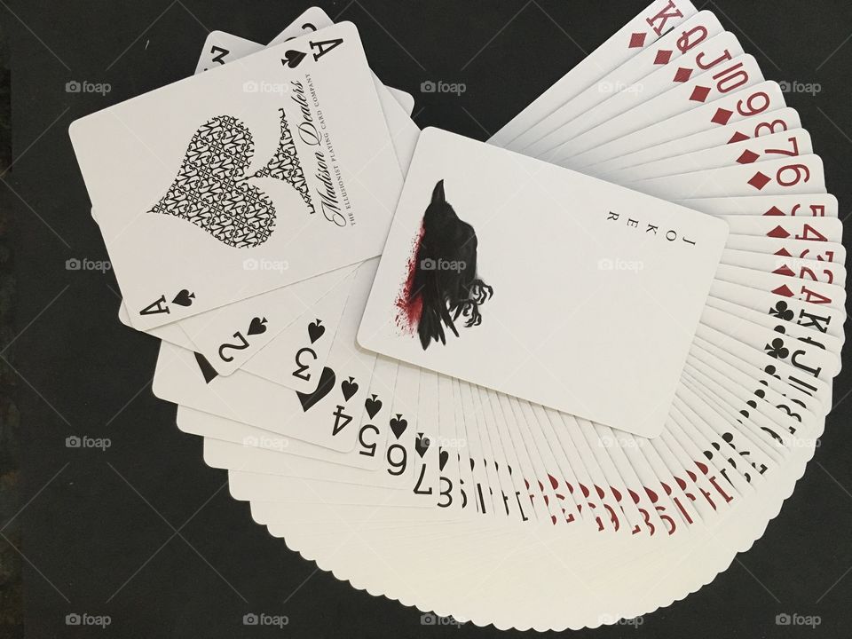 Playing cards on black background