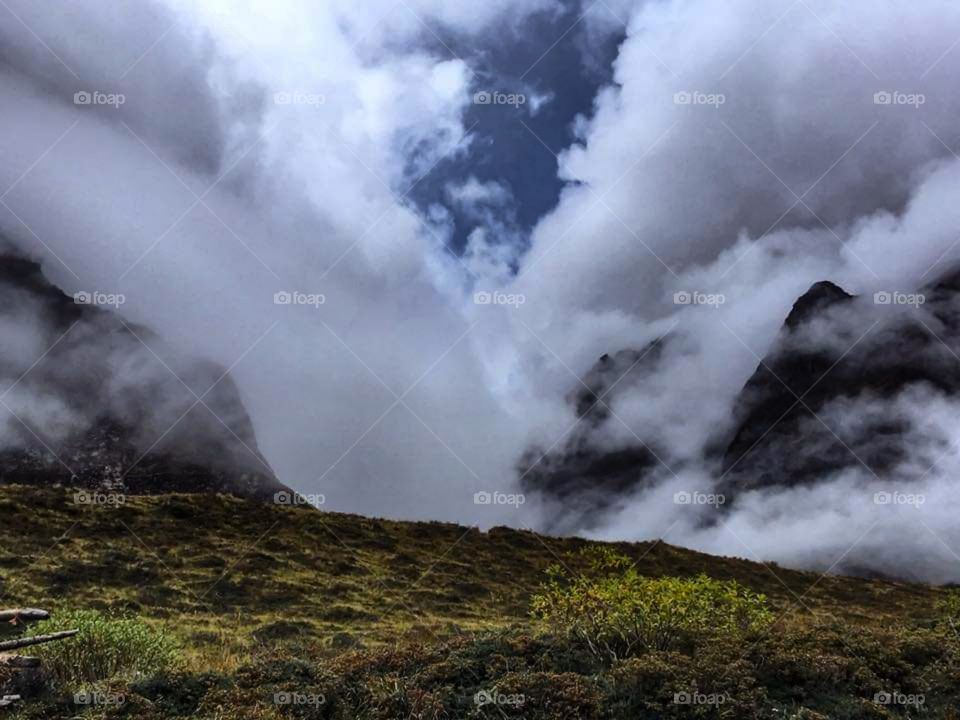 The clouds creep up the valley on the Dhaulagiri Circuit trek in Nepal. They came in extremely fast!
