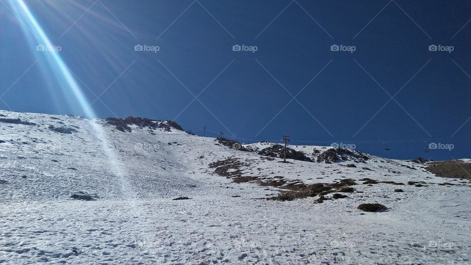 Snow, mountains, sunshine.