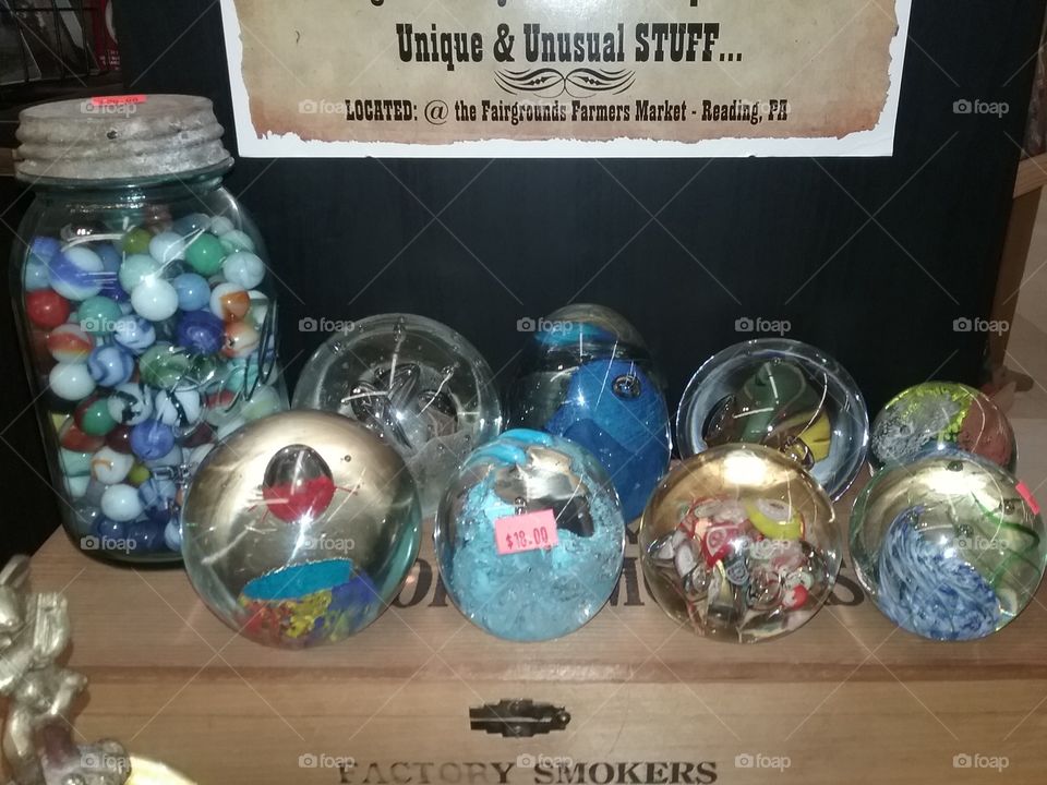 display of Marbles and old glass eggs