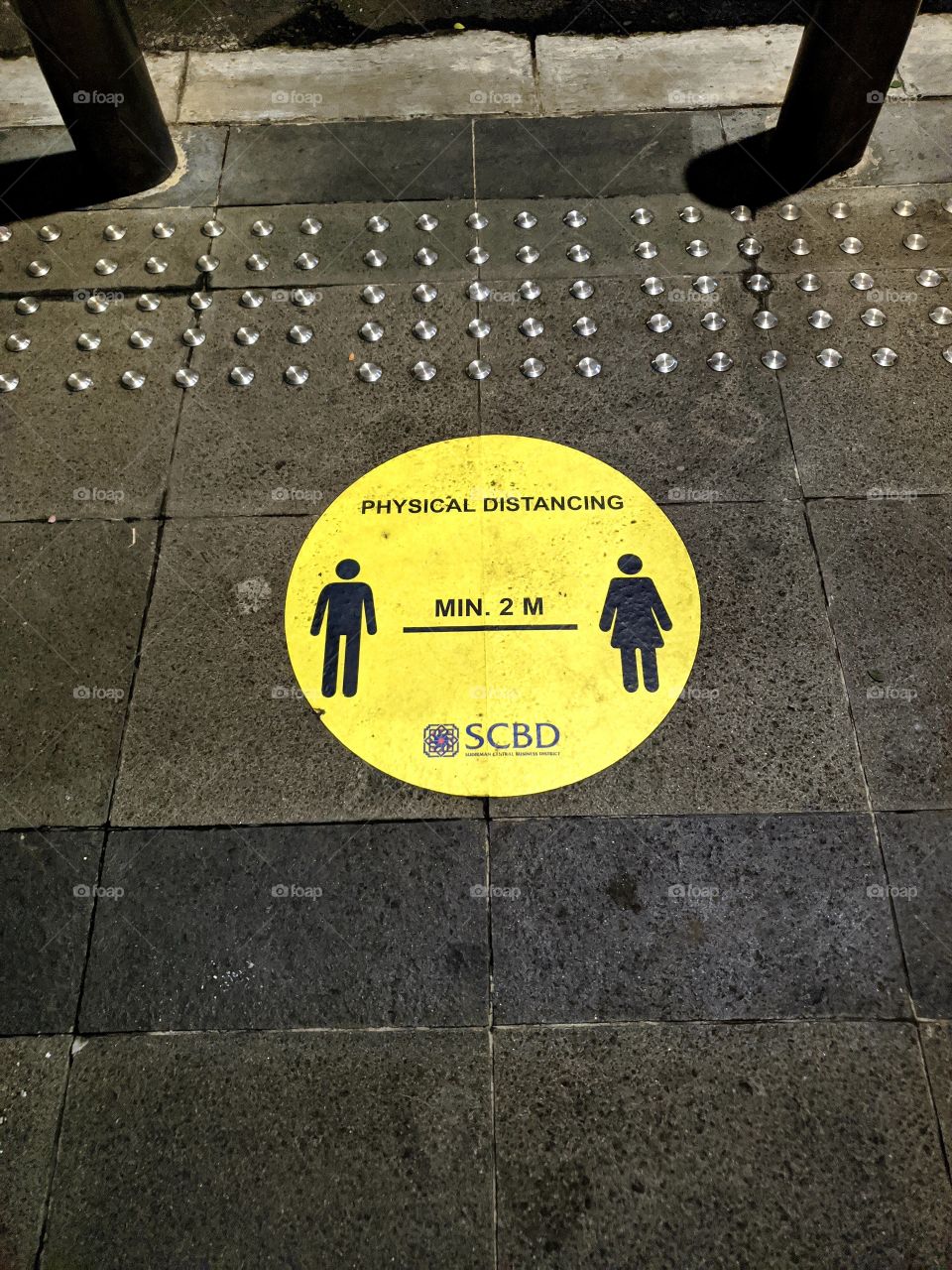 symbol warning about keep distance safe on the street sidewalk