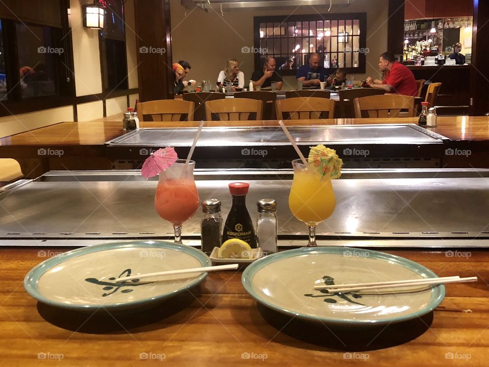 Just the Two of Us, a Table to Ourselves, plates, chopsticks, drinks, table, Japanese Steakhouse, Kobe, Soy Sauce, Lemon, salt, pepper, strangers, restaurant, wood, wooden, steel, metal, glass, fruity, drink, 