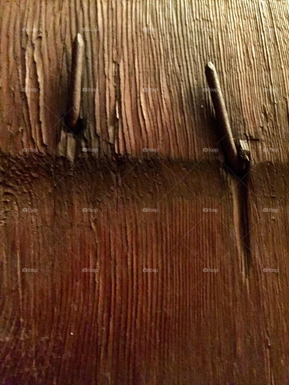 Creative Textures - bent nails in wooden beam