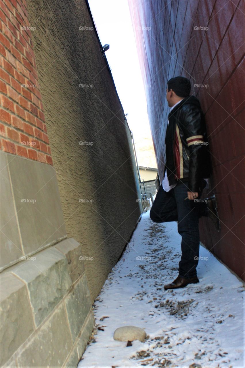 Posing in an alley